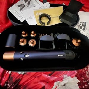 Dyson airwrap-has 2year warranty